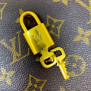 Authentic Louis Vuitton Brass Lock And 2 Key Set